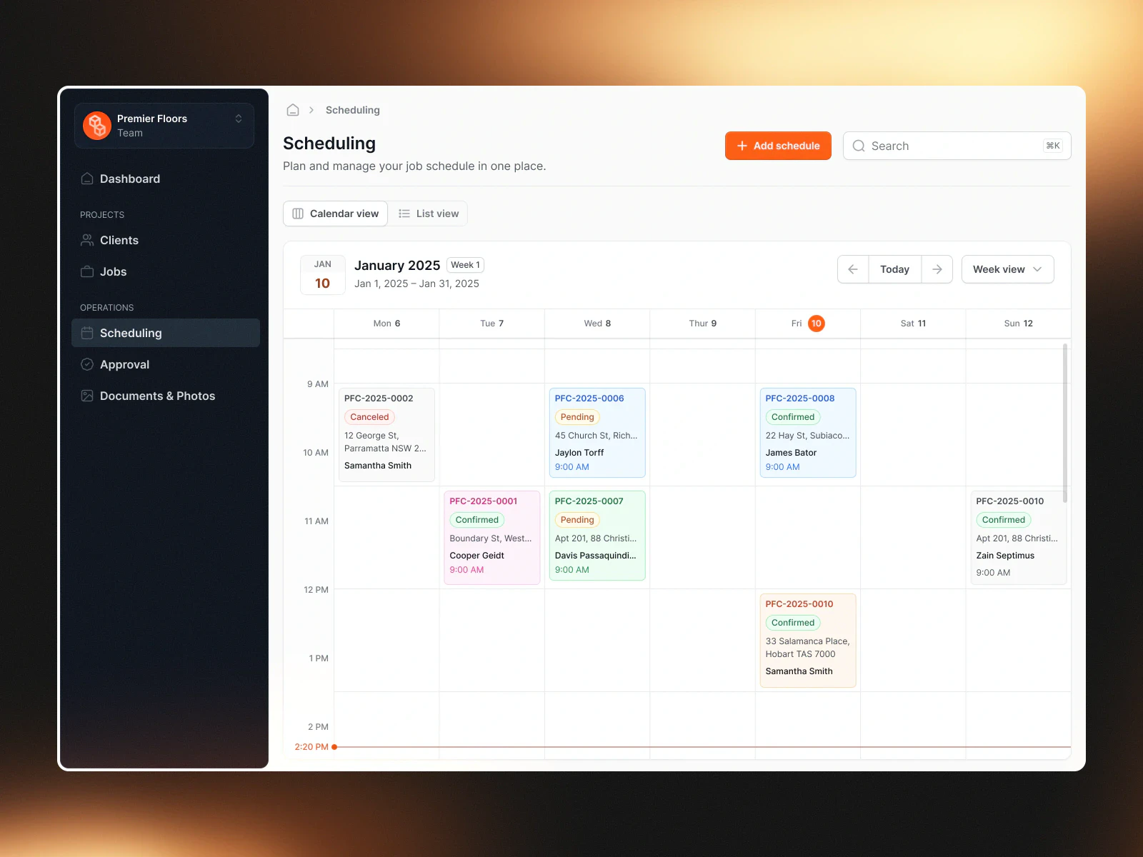 M2tric flooring web app weekly scheduling calendar with colour-coded job cards beside a dark navy sidebar and orange accents