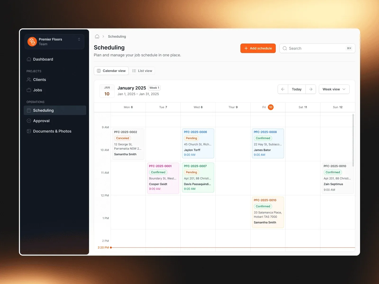M2tric flooring web app weekly scheduling calendar with colour-coded job cards beside a dark navy sidebar and orange accents